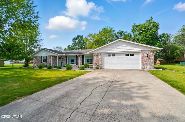 2101 Kimberly Dr, Lima, OH 45805 - ranch-style home featuring an attached garage, driveway, a front lawn, and brick siding