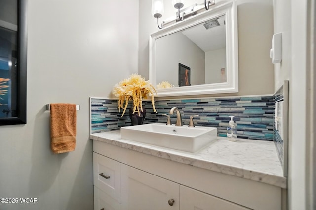 2101 Kimberly Dr, Lima, OH 45805 - bathroom featuring backsplash and vanity