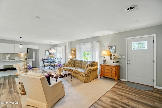 2101 Kimberly Dr, Lima, OH 45805 - living area featuring light wood finished floors and baseboards
