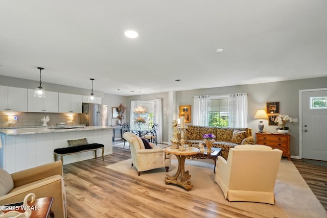2101 Kimberly Dr, Lima, OH 45805 - living room featuring light wood-style floors and recessed lighting