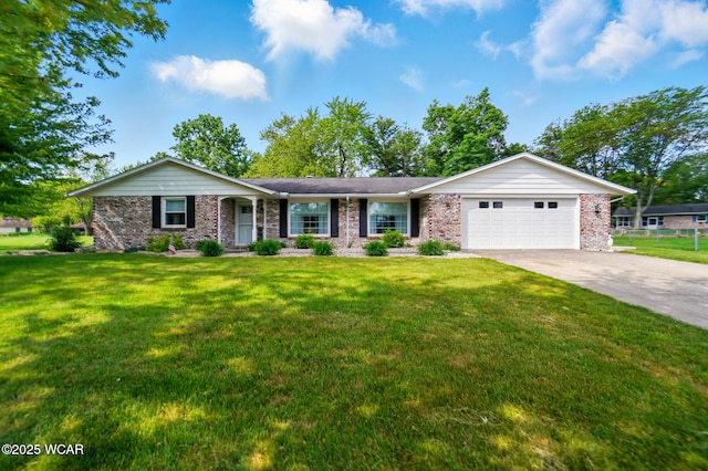 2101 Kimberly Dr, Lima, OH 45805 - ranch-style home with an attached garage, driveway, brick siding, a front lawn, and a porch