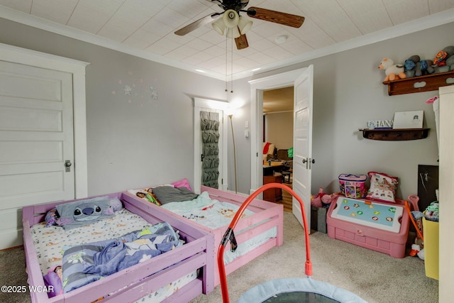 608 W Pearl St, Wapakoneta, OH 45895 - carpeted bedroom with crown molding and a ceiling fan
