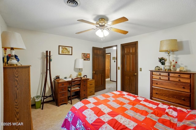 1317 Larry St, Van Wert, OH 45891 - bedroom with light colored carpet, a ceiling fan, and a textured ceiling