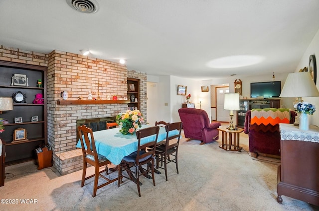 1317 Larry St, Van Wert, OH 45891 - dining area with a fireplace and brick wall