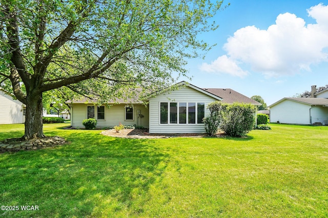 1317 Larry St, Van Wert, OH 45891 - back of property featuring a lawn