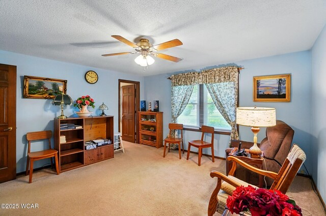 1317 Larry St, Van Wert, OH 45891 - sitting room featuring carpet floors, ceiling fan, and a textured ceiling