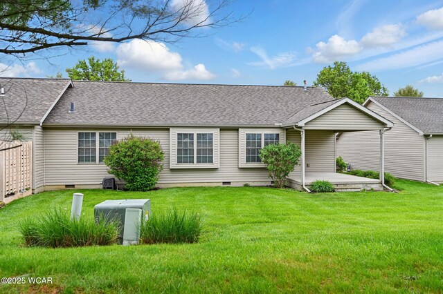 295 Brookview Ct, Lima, OH 45801 - rear view of property with crawl space, a patio area, a lawn, roof with shingles, and central AC