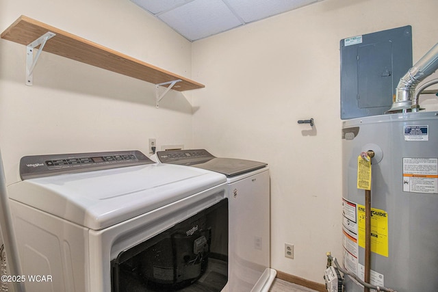 laundry area with washer and dryer, gas water heater, electric panel, and laundry area