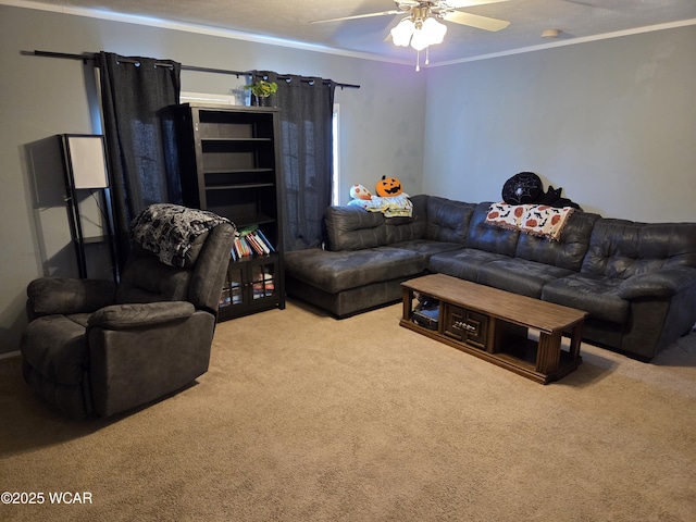 carpeted living room with crown molding and ceiling fan