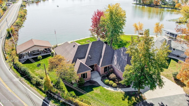 drone / aerial view featuring a water view