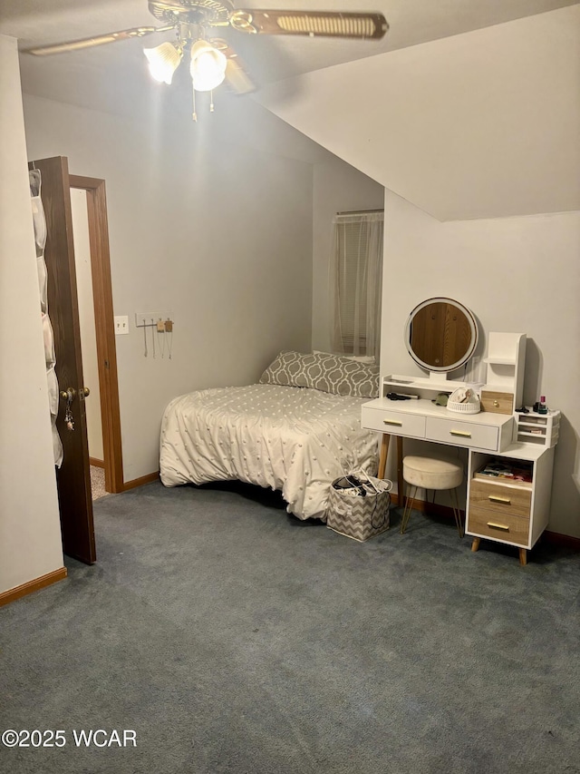 carpeted bedroom featuring vaulted ceiling and ceiling fan