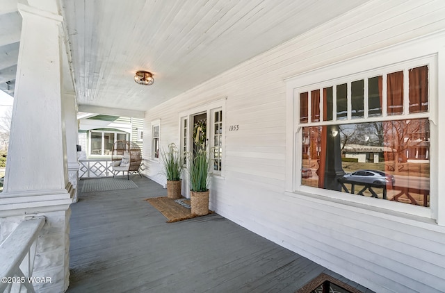 wooden terrace with covered porch