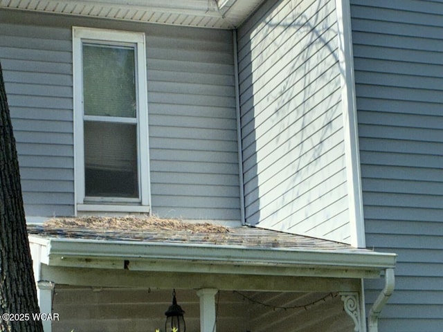 1027 W Elm St, Lima, OH 45805 - exterior view of a downspout and gutters