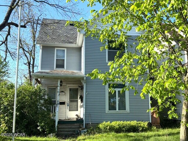 1027 W Elm St, Lima, OH 45805 - view of front facade featuring roof with shingles