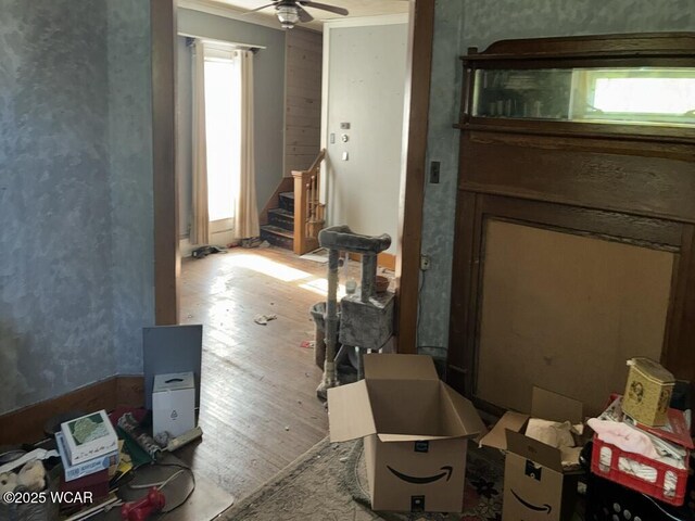 1027 W Elm St, Lima, OH 45805 - living room featuring wood finished floors, stairs, and ceiling fan