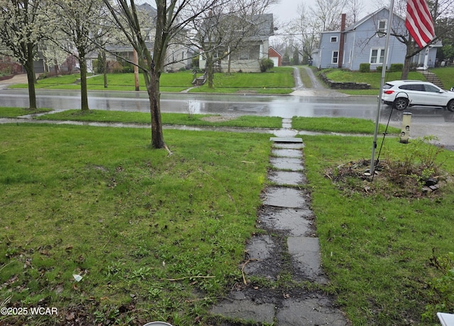 view of yard featuring a water view
