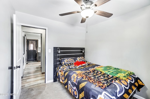 bedroom featuring a closet and ceiling fan