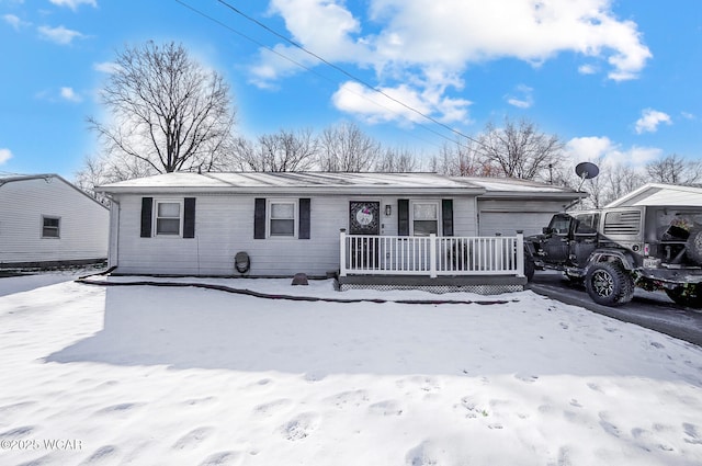 single story home with a porch