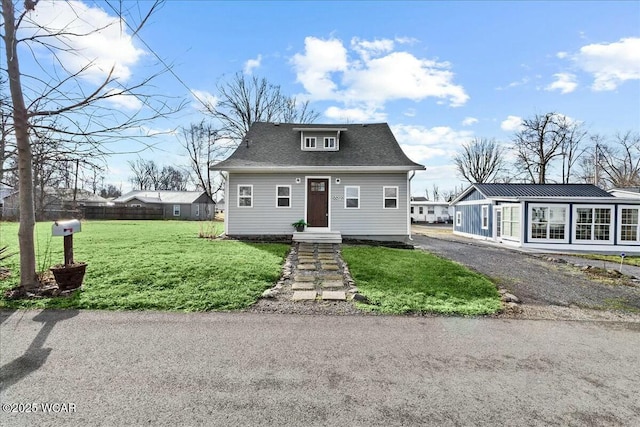 view of front of home with a front yard