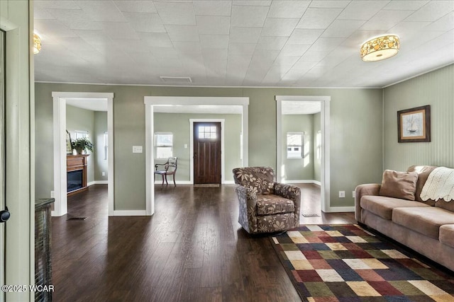 living room with dark hardwood / wood-style floors