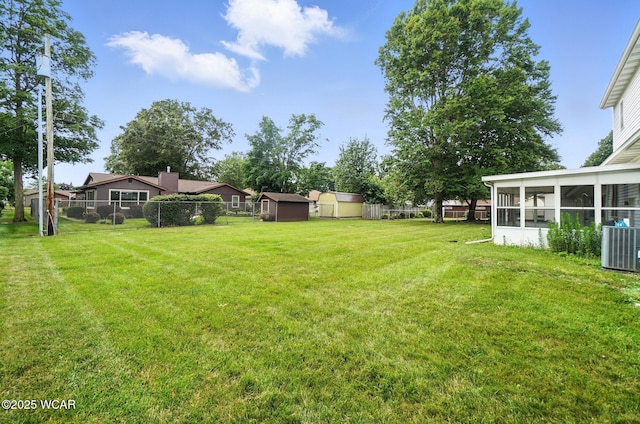 1619 Northbrook Dr, Lima, OH 45805 - view of yard with a storage unit and a sunroom