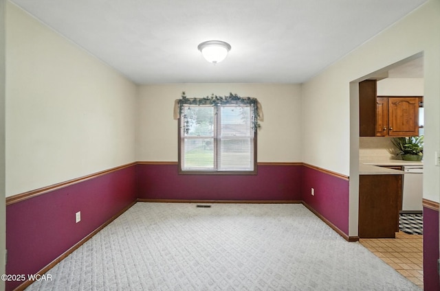 1619 Northbrook Dr, Lima, OH 45805 - unfurnished dining area featuring light carpet