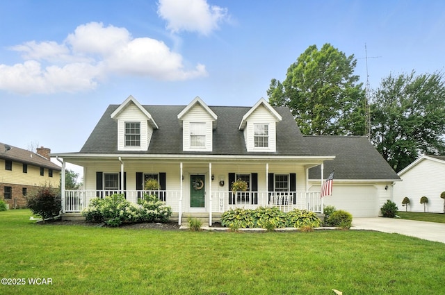 1619 Northbrook Dr, Lima, OH 45805 - cape cod home with a porch, a front lawn, concrete driveway, and an attached garage