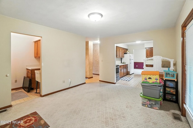 1619 Northbrook Dr, Lima, OH 45805 - recreation room with baseboards and light carpet