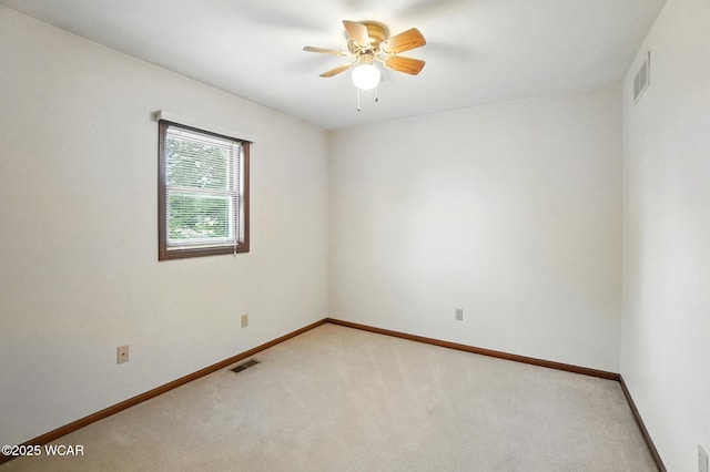 1619 Northbrook Dr, Lima, OH 45805 - unfurnished room featuring light carpet and a ceiling fan