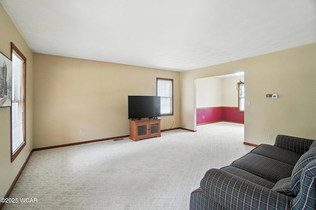 1619 Northbrook Dr, Lima, OH 45805 - living area featuring carpet and healthy amount of natural light