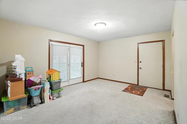 1619 Northbrook Dr, Lima, OH 45805 - recreation room with carpet and baseboards