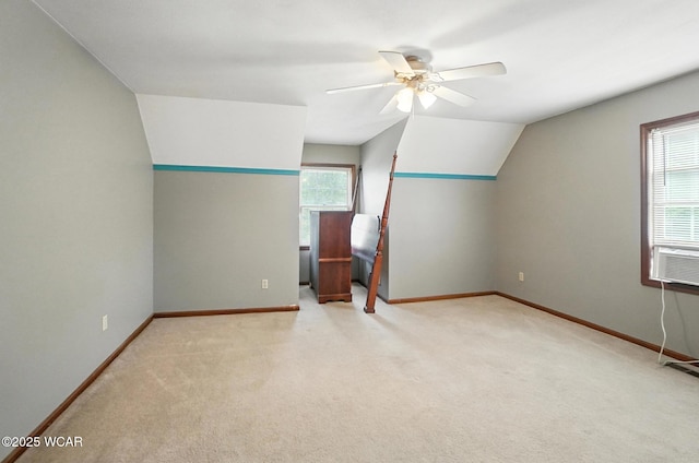 1619 Northbrook Dr, Lima, OH 45805 - additional living space with healthy amount of natural light, carpet floors, a ceiling fan, and vaulted ceiling