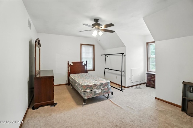 1619 Northbrook Dr, Lima, OH 45805 - bedroom with carpet flooring, multiple windows, ceiling fan, and lofted ceiling