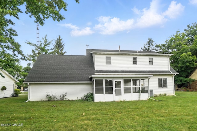 1619 Northbrook Dr, Lima, OH 45805 - back of property with a yard, a sunroom, and a shingled roof