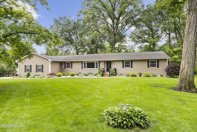 3139 Clifford Dr, Lima, OH 45805 - ranch-style home with a front yard