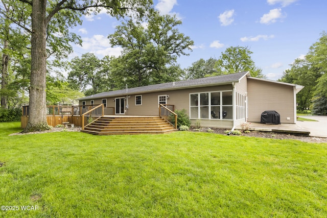 3139 Clifford Dr, Lima, OH 45805 - rear view of house with a deck, a lawn, and stairway