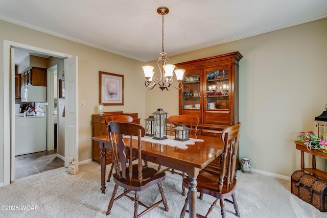 5295 E Rd, Lima, OH 45807 - dining space with an inviting chandelier, carpet floors, ornamental molding, and baseboards