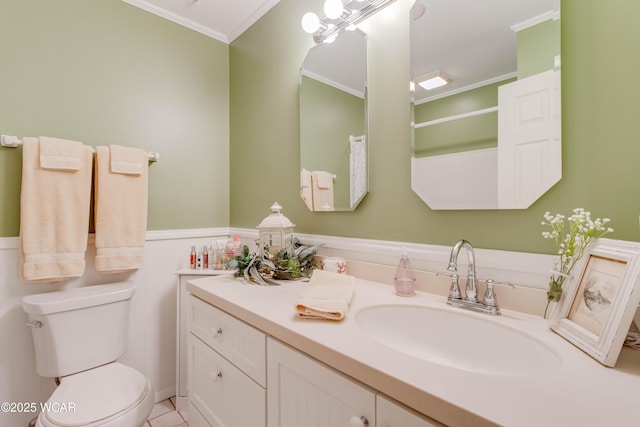 5295 E Rd, Lima, OH 45807 - bathroom with toilet, ornamental molding, tile patterned flooring, and vanity