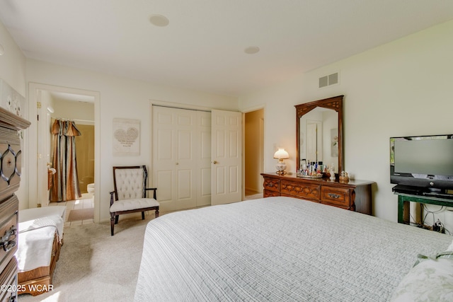 5295 E Rd, Lima, OH 45807 - bedroom with visible vents, a closet, and light colored carpet