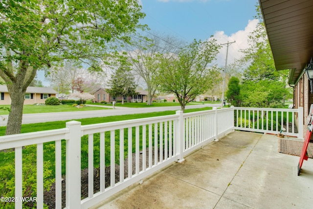 5295 E Rd, Lima, OH 45807 - balcony featuring covered porch and a residential view