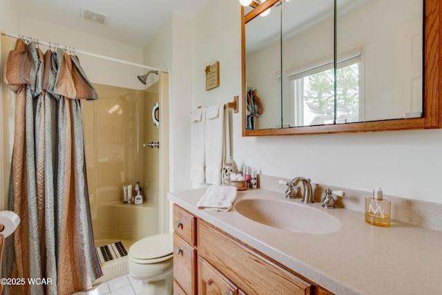 5295 E Rd, Lima, OH 45807 - full bath featuring visible vents, tile patterned flooring, vanity, toilet, and a stall shower