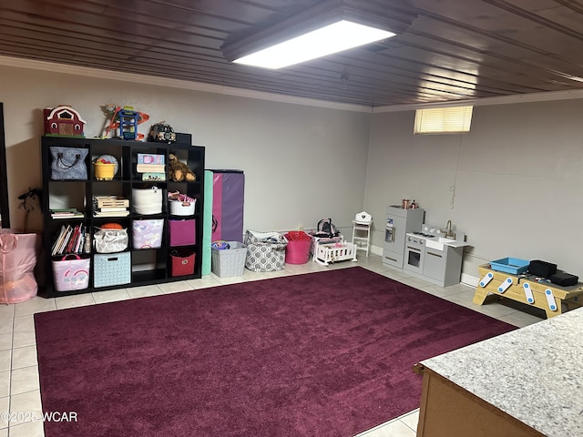 400 N Westminster St, Waynesfield, OH 45896 - rec room with light tile patterned floors and ornamental molding