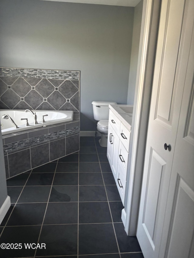 25853 Rd M, Cloverdale, OH 45827 - bathroom featuring a garden tub, vanity, and tile patterned flooring