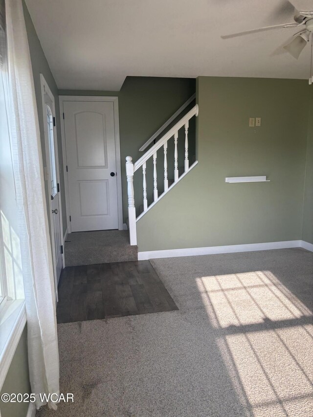 25853 Rd M, Cloverdale, OH 45827 - carpeted entrance foyer with ceiling fan and stairs