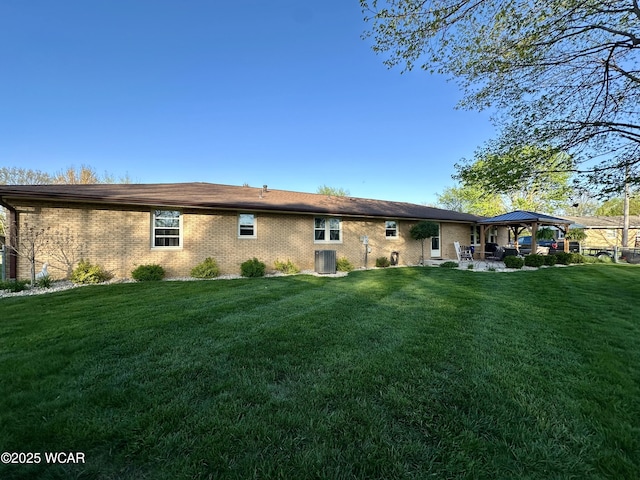 305 Fenway Dr, Lima, OH 45804 - rear view of property with a gazebo, brick siding, and a yard