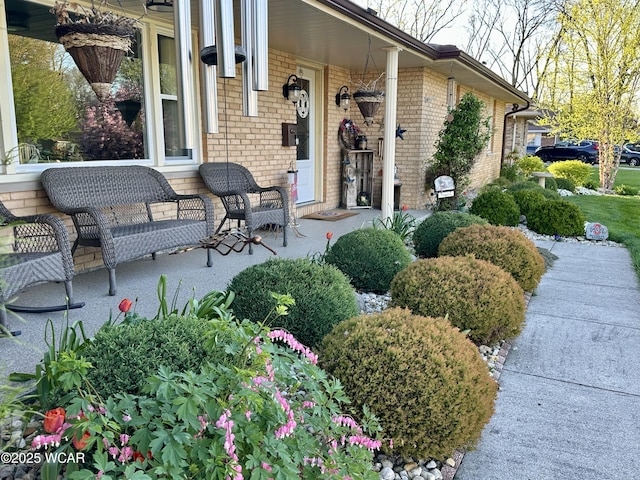 305 Fenway Dr, Lima, OH 45804 - view of exterior entry with brick siding and covered porch
