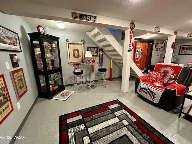 305 Fenway Dr, Lima, OH 45804 - living room featuring stairs and speckle patterned floor