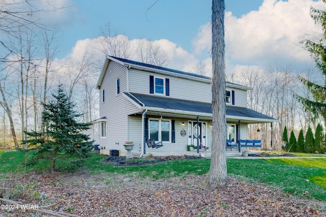 front facade featuring a front lawn