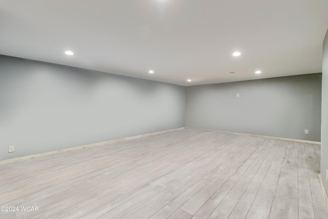 unfurnished room featuring light hardwood / wood-style floors