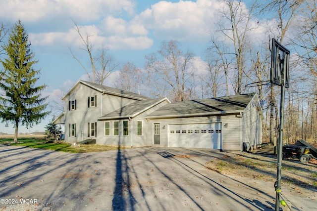 view of front of property with a garage